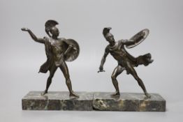 A pair of early 20th century bronze classical warriors, marble bases,tallest 21 cms high,