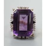 A 585 white metal emerald cut amethyst and diamond set cluster ring, size L, gross weight 11.5