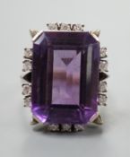 A 585 white metal emerald cut amethyst and diamond set cluster ring, size L, gross weight 11.5