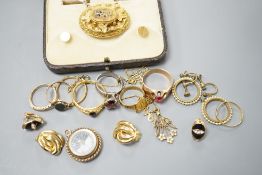 A 22ct gold wedding band 2.3 grams, a Victorian yellow metal and gem set oval brooch and other