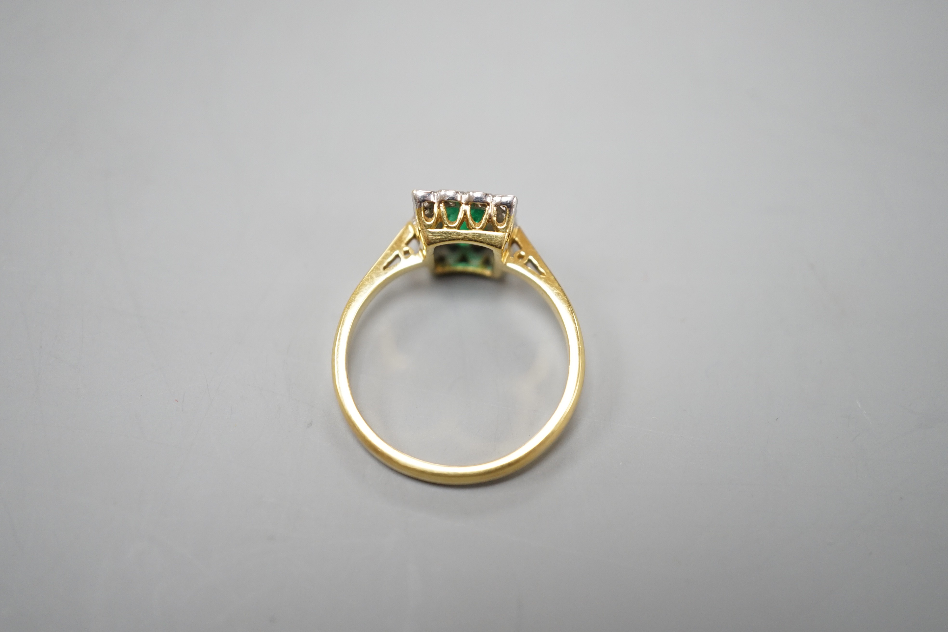 A modern 18ct gold, emerald and diamond set rectangular cluster ring, size N, gross weight 3.4 - Image 4 of 4