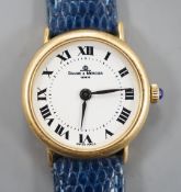 A lady's modern 18k Baume & Mercier manual wind wrist watch, with Roman dial, on associated