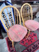 A set of six Ercol light elm and beech comb back chairs, width 45cm, depth 44cm, height 89cm