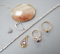 A 9kt white metal and diamond set bracelet, a 9ct mounted agate brooch, two rings including 18k, two