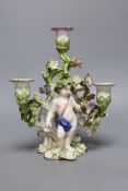 An 18th century English porcelain 3 branch candelabrum, probably Bow,23cms high,