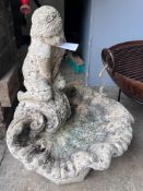 A reconstituted stone figural scallop shell bird bath, height 66cm