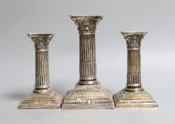 A pair of George V silver Corinthian column dwarf candlesticks, Cooper Brothers & Sons, Sheffield,