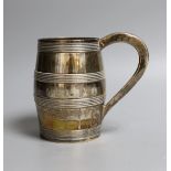 A George III silver barrel shaped pint mug, with reeded bands, Thomas Law, Sheffield, 1802, 12.
