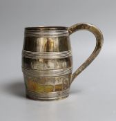 A George III silver barrel shaped pint mug, with reeded bands, Thomas Law, Sheffield, 1802, 12.