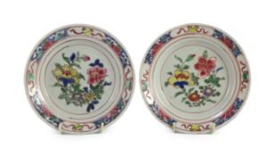 A pair of Chinese famille rose fencai small plates, early Yongzheng period,16 cms diameter, each
