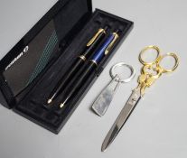 Two Pelikan ballpoint pens boxed with guarantee, 1996, a pair of Solingen scissors and a silver