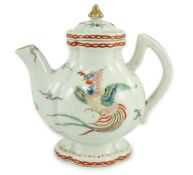A small Japanese Arita kakiemon style water or teapot, possibly Edo period,11 cms high, painted with