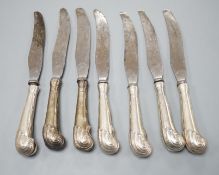 A set of seven William IV silver pistol handled dessert knives, Sheffield, 1836, engraved with the
