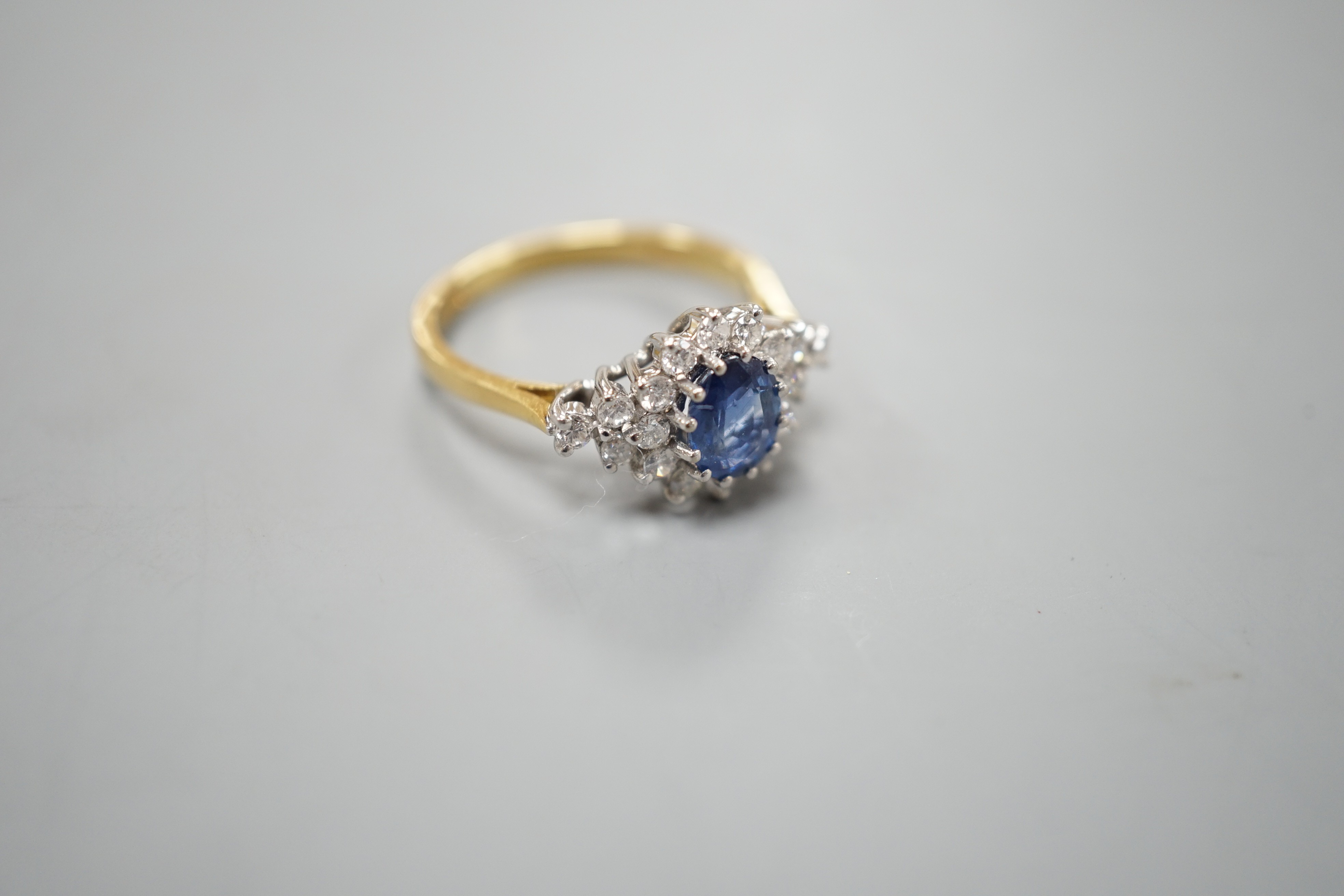 A modern 18ct gold, sapphire and diamond set elliptical shaped cluster dress ring, size N, gross - Image 3 of 3