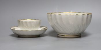 A Neale and Co rare teabowl and saucer and a matching bowl, each piece with acanthus leaf and