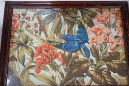 A large rare tortoiseshell picture frame and exotic panel of printed fabric,70 cms wide x 52 cms