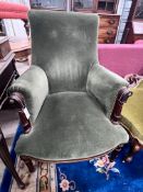 An early 20th century gilt metal mounted upholstered mahogany armchair, width 72cm, depth 74cm,