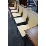 A set of five Italian cream leather and chrome dining chairs