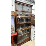 A Globe Wernicke six section mahogany bookcase with leaded glazed doors, length 87cm, depth 29cm,