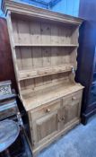 A Victorian style narrow pine dresser, width 104cm, depth 42cm, height 185cm