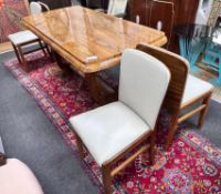 An Art Deco style walnut extending dining table, length 170cm extended, width 80cm, height 77cm