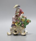 A Bow good figure of Spring on a scroll moulded base painted with flowers, having an anchor dagger