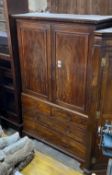 A George III mahogany linen press, converted to a hanging wardrobe, width 116cm, depth 55cm,