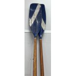 A pair of vintage wooden oars with painted blades, length 298cm