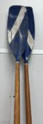 A pair of vintage wooden oars with painted blades, length 298cm