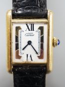 A lady's modern 925 gilt Must de Cartier rectangular quartz wrist watch, with three colour dial,