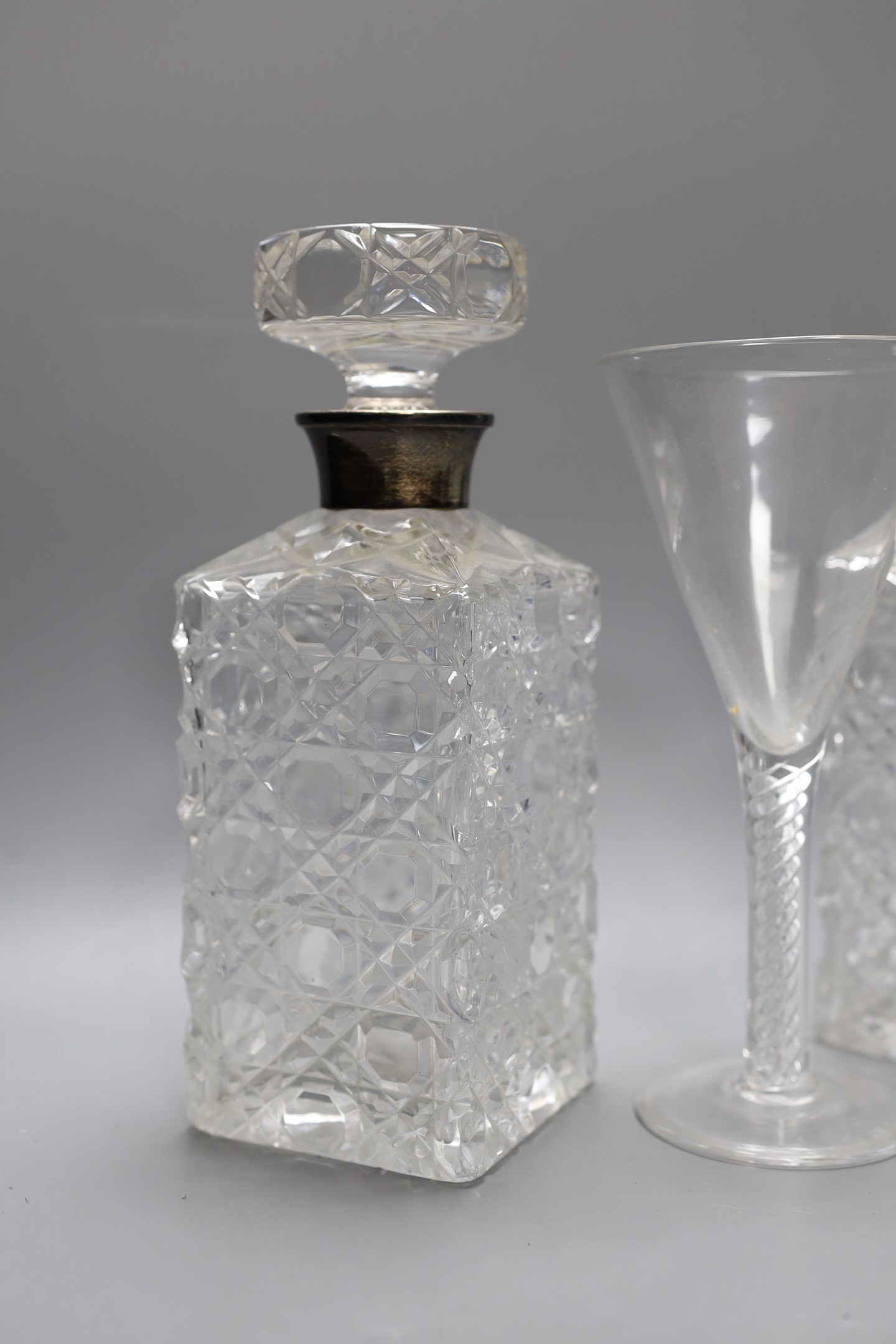 A pair of silver mounted cut glass decanters and stoppers and an air twist stemmed goblet, - Bild 2 aus 4