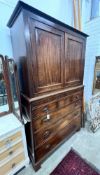 A George III North Country mahogany press cupboard, length 124cm, depth 56cm, height 211cm
