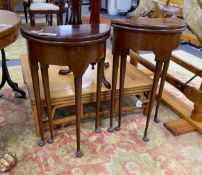 A near pair of small George II style red walnut D shaped folding tea tables, width 45cm, depth 22cm,