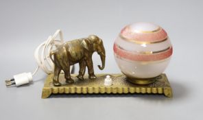 An Art Deco French bronze elephant lamp with gilt and red stripe globe shade 22cm