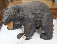 A Japanese carved wood bear,35 cms wide,