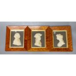 Three Maple framed framed wax portrait reliefs by Leslie Ray,10 cms high x 8 cms wide,