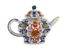 A small Chinese Imari octagonal teapot, Kangxi period,10 cms high, painted with alternating panels