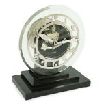 An Ato Art Deco electric mantel timepiece,22cms high, the glass dial with chromed arabic chapter
