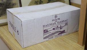 Twelve bottles of Mas de Daumac Gassac, 1998.