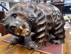 A large Japanese carved wood bear,40 cms high,