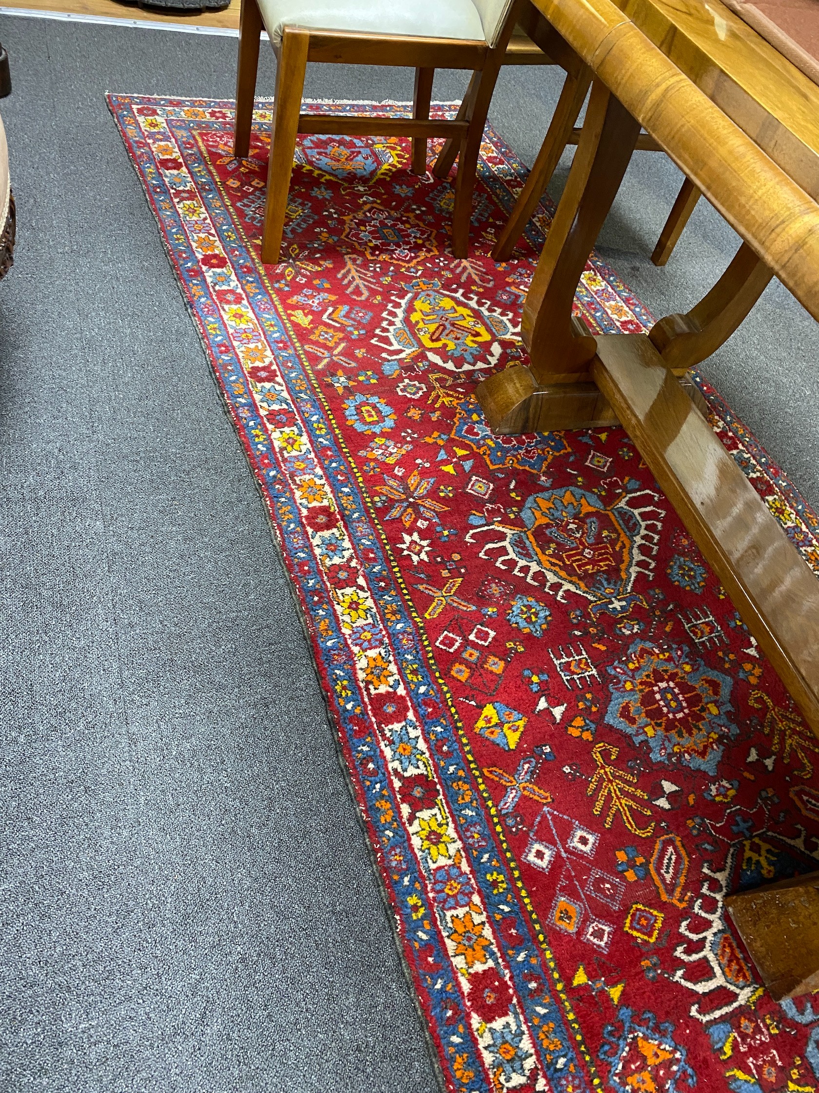 A North West Persian red ground runner, 426 x 100cm - Image 4 of 5