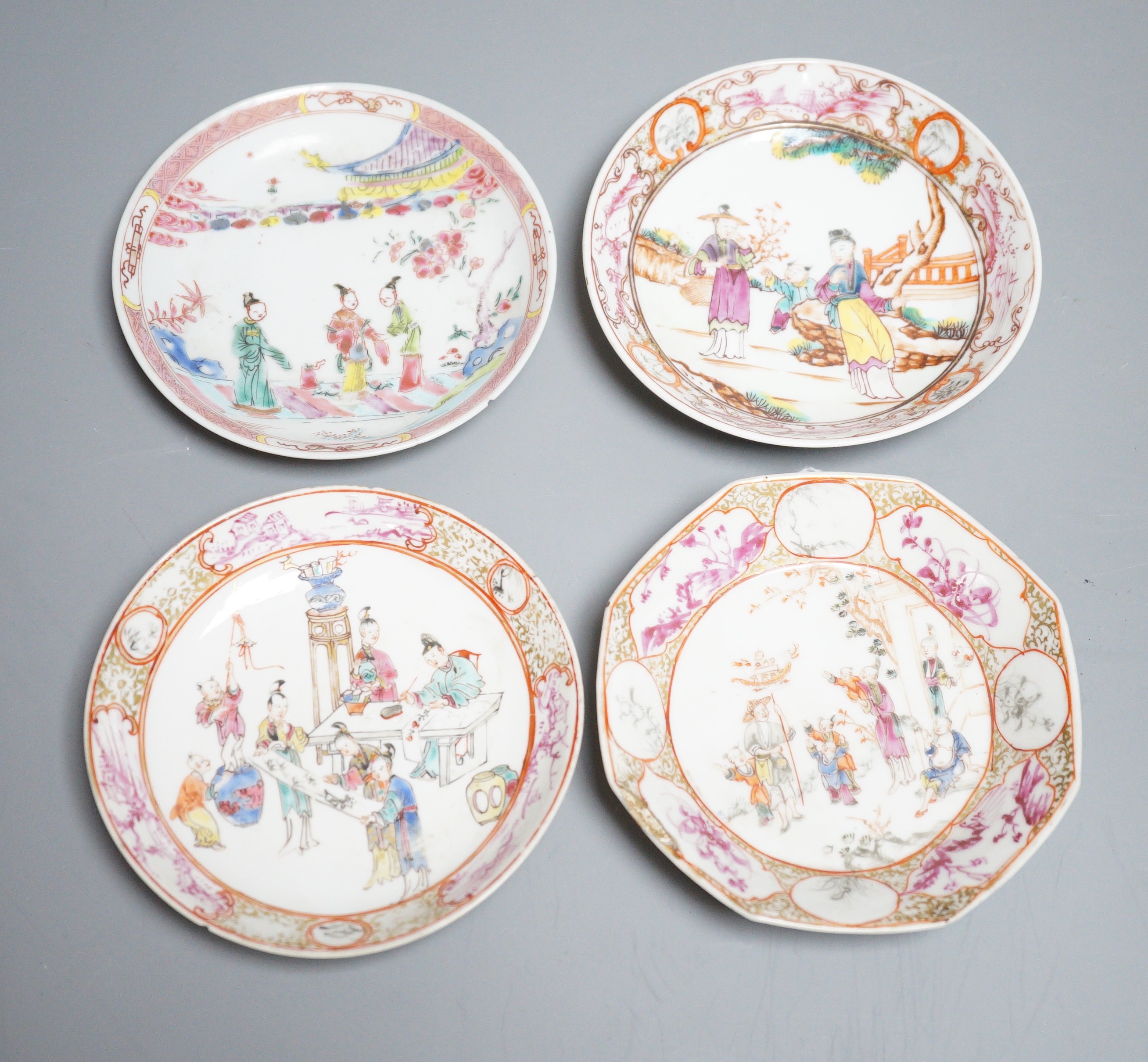 A group of four 18th century Chinese export famille rose saucers,