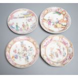 A group of four 18th century Chinese export famille rose saucers,