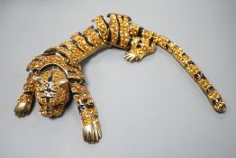 A costume gilt metal and paste set tiger shoulder? ornament, 24.5cm.