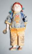 An early 20th century Chinese papier-mâché doll