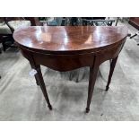 A George III mahogany demi-lune folding tea table, width 92cm, depth 45cm, height 74cm