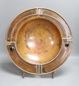 Sam Fanaroff - A large copper dish on stand, (Sussex Guild, West Ham, Pevensey),45 cms diameter,