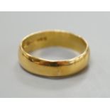 A 1960's 22ct gold wedding band, size R/S, 5.7 grams.