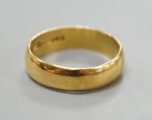 A 1960's 22ct gold wedding band, size R/S, 5.7 grams.