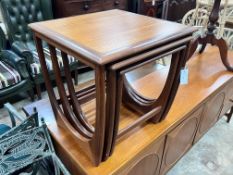 A nest of three G Plan square teak tea tables, 49cm, height 51cm